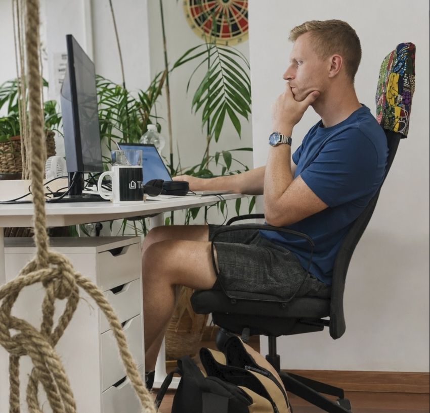 Seán working at a desk