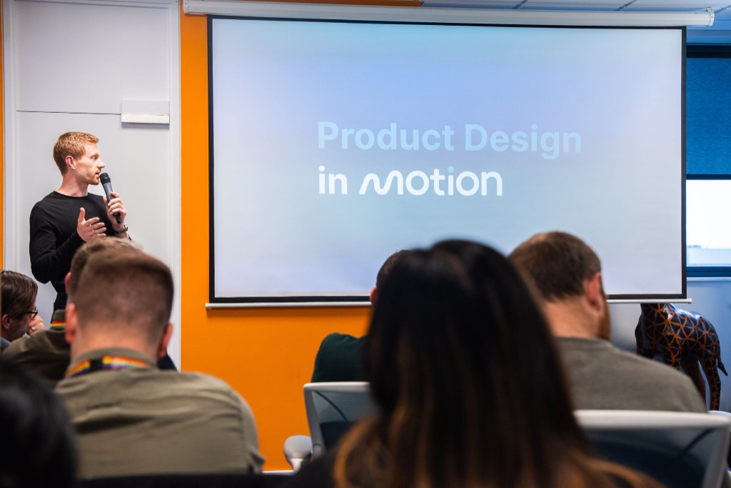 Sean Mallen speaking about product design in front of an audience